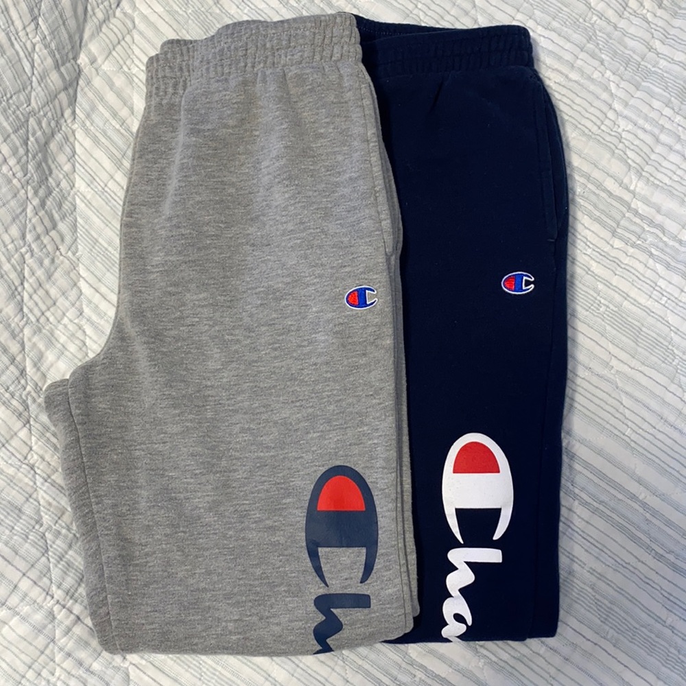Two pairs of kids champion sweatpants.